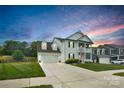 Inviting two-story home with a spacious driveway and well-maintained lawn, perfect for families at 2019 Taylorcrest Dr, Fort Mill, SC 29715