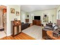 Cozy living room with hardwood floors, ample natural light, and classic decor at 5215 Milford Rd, Charlotte, NC 28210
