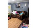 Comfortable living room with leather seating at 6552 Denver Heights Cir, Denver, NC 28037