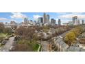 Scenic aerial view of the townhome community with the city skyline at 840 Garden District Dr, Charlotte, NC 28202