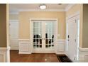 Spacious foyer featuring hardwood floors and entry to office at 13127 Centennial Commons Pkwy, Huntersville, NC 28078