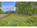Well-maintained yard with lush greenery surrounding the property at 298 Poplar Grove Ct, Taylorsville, NC 28681