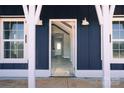 The home's entry way provides an open view of the light filled interior at 1432 Blackbird Dr, Clover, SC 29710