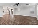 Bright living area with hardwood floors, recessed lights, and slider to the backyard at 2092 Fordhill St, Rock Hill, SC 29732