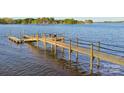 Waterfront dock on the lake with seating, perfect for enjoying the lake view at 8813 Graham Rd, Denver, NC 28037