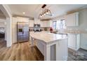 Bright kitchen featuring stainless steel appliances, an island, and recessed lighting at 185 Crystal Bay Dr, Mooresville, NC 28115