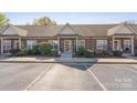 Brick condo complex with well-maintained landscaping, offering a welcoming and pleasant curb appeal at 2783 Clover Nw Rd, Concord, NC 28027