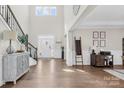 Spacious foyer with hardwood floors and abundant natural light, providing a bright and welcoming atmosphere at 7313 Glenroe Dr, Huntersville, NC 28078