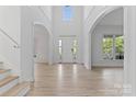 Inviting foyer with hardwood floors, high ceilings, and ample natural light at 15009 Lisha Ln, Charlotte, NC 28277