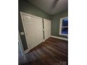 Bedroom featuring ample closet space and a window providing natural light, creating a cozy atmosphere at 1703 Polk St, Monroe, NC 28110