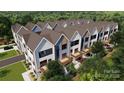 Overhead view of new construction townhomes featuring modern design, private decks, and lush landscaping at 3012 Yada Ln, Charlotte, NC 28208