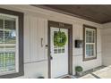 Inviting front entry of home showcasing the door's unique design and curb appeal at 306 7Th Sw St, Hickory, NC 28602