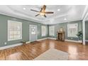 Bright and airy living room with hardwood floors, a stone fireplace, and recessed lighting at 306 7Th Sw St, Hickory, NC 28602