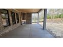 Inviting outdoor space with a fireplace, offering a seamless transition from indoor to outdoor living at 1009 Marthas Meadow Ln # 5, Monroe, NC 28112