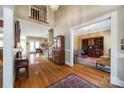 Bright foyer with hardwood floors, high ceilings, and an open view to the office and living areas at 1515 Paul Boyd Rd, Clover, SC 29710