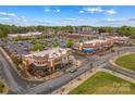 Aerial view showcasing nearby commercial development and community amenities at 19737 Playwrights Way, Cornelius, NC 28031