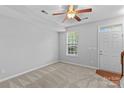Bright bedroom with neutral carpet and a ceiling fan, ready for personalization at 19737 Playwrights Way, Cornelius, NC 28031
