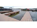 Waterfront home showcasing a private boat dock perfect for lake living at 2587 Penngate Dr, Sherrills Ford, NC 28673