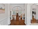 Elegant living room featuring hardwood floors, fireplace, and an open archway at 2587 Penngate Dr, Sherrills Ford, NC 28673