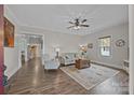 Bright living room with hardwood floors and neutral decor at 405 E 3Rd St, Kannapolis, NC 28083