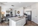 Open concept kitchen with granite counters, stainless steel appliances, island and view to the living room at 882 Two Brothers Ln, York, SC 29745