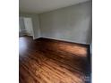 Spacious living room with new laminate flooring and lots of natural light at 443 Silversmith Ln, Charlotte, NC 28270