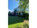 Charming two-story home with a well-manicured lawn and welcoming front porch at 4519 S Potter Rd, Monroe, NC 28112