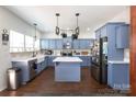 Bright, airy kitchen with stainless steel appliances and a center island at 4519 S Potter Rd, Monroe, NC 28112