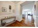 Open foyer with hardwood floors leading to a spacious living area and kitchen at 1211 Croft Dr, Fort Mill, SC 29708