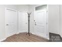 Bright entryway featuring pristine white doors and trim, enhancing the home's welcoming feel at 1774 Slippery Rock Ln, Monroe, NC 28112