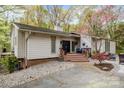 Beautiful home with a charming entrance, stone accents, and well-maintained landscaping for great curb appeal at 27 Heritage Ct, Lake Wylie, SC 29710