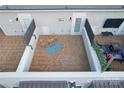 Private rooftop terrace with cozy seating and stunning views, perfect for relaxing outdoors at 327 Uptown West Dr, Charlotte, NC 28208