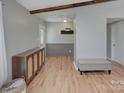 Inviting entryway with stylish furniture, wood-look flooring, and decorative accents at 6201 Sellars Ct, Charlotte, NC 28211