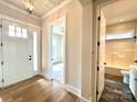 Bright entryway with hardwood floors, leading to bedroom and bathroom at 174 Fulworth Nw Dr # 65, Concord, NC 28027