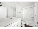 Bright bathroom featuring a shower and tub combination with a white vanity at 700 Sunset Pointe Dr, Salisbury, NC 28146