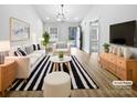 Bright living room with modern furniture, stylish decor, and an open floor plan at 1638 Pineburr Ln, Rock Hill, SC 29730