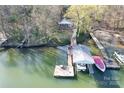 Aerial view of waterfront property showing the house, boat dock, and lake access for recreational enjoyment at 1657 Bowater Rd, Rock Hill, SC 29732