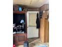 Living room with wood paneling at 3260 Reepsville Rd, Lincolnton, NC 28092