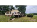 Well-maintained backyard with a spacious deck perfect for outdoor dining and relaxation at 403 Branch St, Kings Mountain, NC 28086