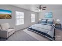Cozy bedroom with natural light and serene decor, creating a peaceful retreat at 5670 Hammermill Dr, Harrisburg, NC 28075