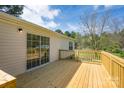 The wooden deck provides a great space for relaxing and enjoying the backyard at 574 Pamela Rd, York, SC 29745