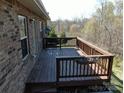 Backyard deck with wooden railing provides a great outdoor space at 7283 Bradberry Ln, Denver, NC 28037