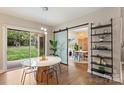 Open dining room with sliding doors to the backyard and stylish decor at 2529 Daniel St, Charlotte, NC 28205