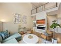 Comfortable living area with modern decor, a fireplace, and lots of natural light at 2529 Daniel St, Charlotte, NC 28205