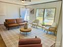Inviting living room featuring a cozy seating arrangement, natural light, and modern decor at 3144 Rickwood Dr, Newton, NC 28658