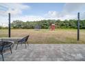 Large backyard with a stone patio, a trampoline, and a playset at 3810 New Salem Rd, Monroe, NC 28110