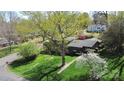 Aerial view of a home with mature landscaping and a large shade tree at 501 Eastwood Dr, Gastonia, NC 28054