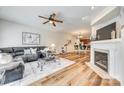 Inviting living room with wood floors, a fireplace, and a cozy sectional sofa at 2023 Aragon Ln, Gastonia, NC 28056