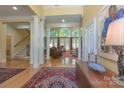 Grand foyer with hardwood floors, columns, and large windows offer a sense of spaciousness and elegance at 310 Berkeley Rd, Rock Hill, SC 29732