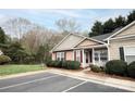 Well-maintained townhouse with manicured bushes, and a cozy front porch at 222 Baldwin Ct, Rock Hill, SC 29730